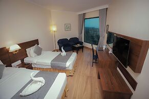 The Quilon Beach Hotel and Convention Center