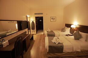 The Quilon Beach Hotel and Convention Center