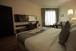 The Quilon Beach Hotel and Convention Center