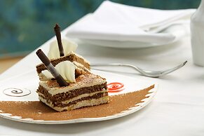 The Quilon Beach Hotel and Convention Center