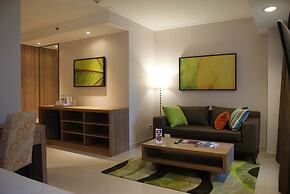 Grand Tropic Suites Hotel