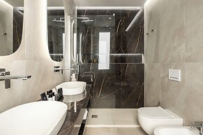 Aramis Deluxe Rooms