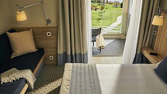 ROBINSON KYLLINI BEACH