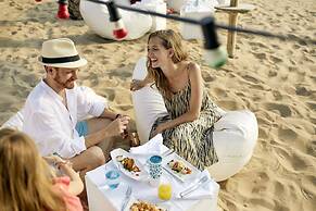 ROBINSON KYLLINI BEACH