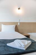 Cobblestone Court Motel – Wenzel Motels