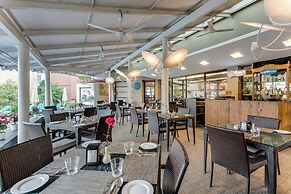 Whispering Palms Beach Resort