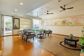 Whispering Palms Beach Resort