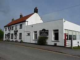 The Wilson Arms