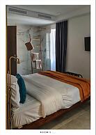 Le Petit Trianon et Le Charme des Suites