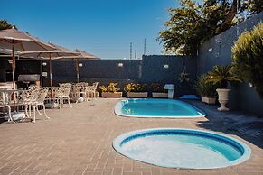 Charm Iguassu Suites Pousada