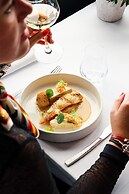 L'Ermitage Hôtel Cuisine-à-Manger