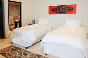El Taj Oceanfront & Beachside Condo Hotel