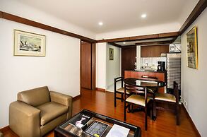 Travelers Suites Condominio Plenitud