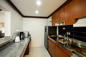 Travelers Suites Condominio Plenitud