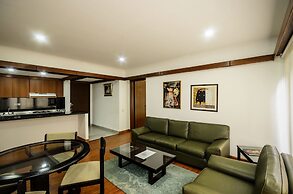 Travelers Suites Condominio Plenitud
