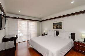 Travelers Suites Condominio Plenitud