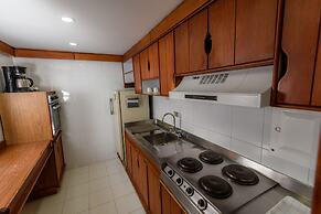 Travelers Suites Condominio Plenitud