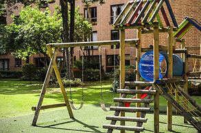 Travelers Suites Condominio Plenitud