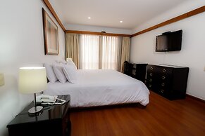Travelers Suites Condominio Plenitud