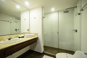 Travelers Suites Condominio Plenitud