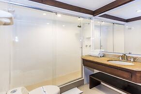 Travelers Suites Condominio Plenitud