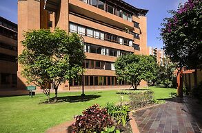 Travelers Suites Condominio Plenitud