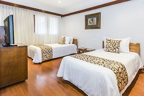 Travelers Suites Condominio Plenitud