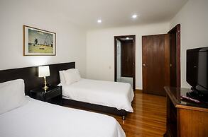 Travelers Suites Condominio Plenitud
