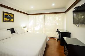 Travelers Suites Condominio Plenitud