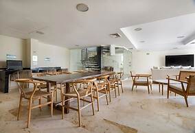 The Elements Oceanfront & Beachside Condo Hotel