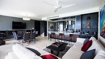 The Elements Oceanfront & Beachside Condo Hotel