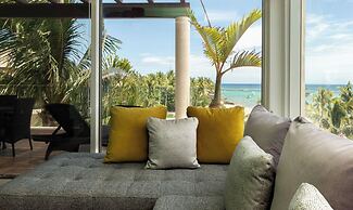 The Elements Oceanfront & Beachside Condo Hotel