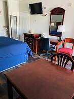Magnolia Inn And Suites