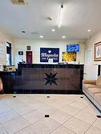 Magnolia Inn And Suites