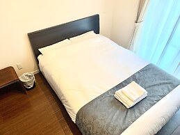 Mr. Kinjo SATOMO in Ginowan