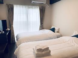 Mr. Kinjo SATOMO in Ginowan