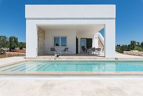 Villa, Trulli e Piscina nel Cuore della Valle d'Itria