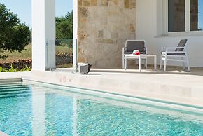 Villa, Trulli e Piscina nel Cuore della Valle d'Itria