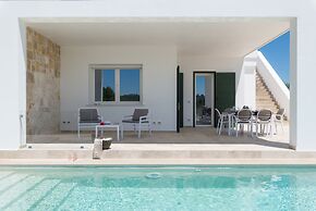 Villa, Trulli e Piscina nel Cuore della Valle d'Itria