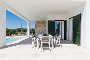 Villa, Trulli e Piscina nel Cuore della Valle d'Itria