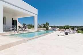 Villa, Trulli e Piscina nel Cuore della Valle d'Itria