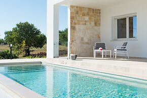 Villa, Trulli e Piscina nel Cuore della Valle d'Itria