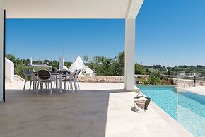 Villa, Trulli e Piscina nel Cuore della Valle d'Itria