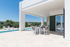 Villa, Trulli e Piscina nel Cuore della Valle d'Itria
