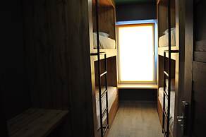 Full House Capsule Hostel