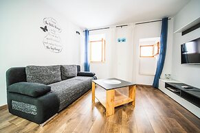 M & J Central Suites