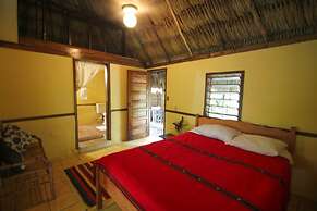 Cohune Palms River Cabanas