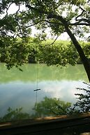 Cohune Palms River Cabanas