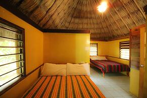 Cohune Palms River Cabanas