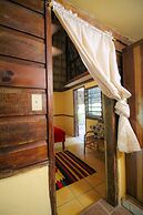 Cohune Palms River Cabanas